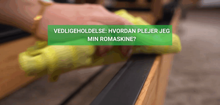 Hånd med gul klud tørrer skinne på romaskine i træ